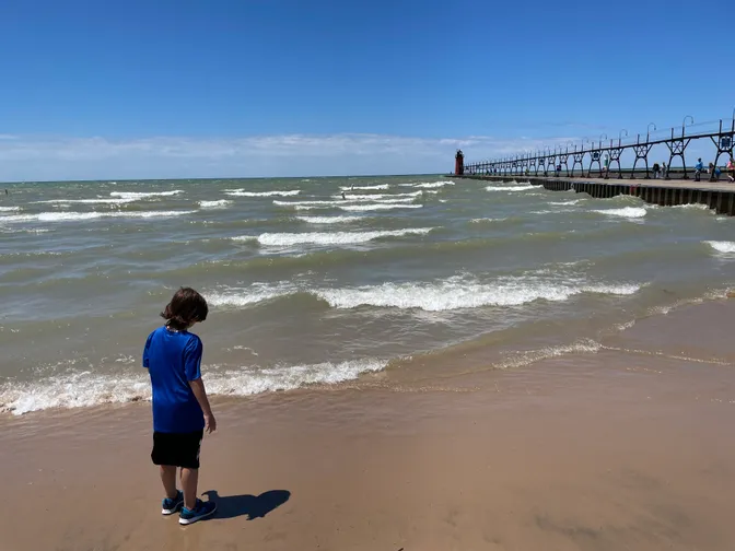 Beach with a lighthouse in the distance