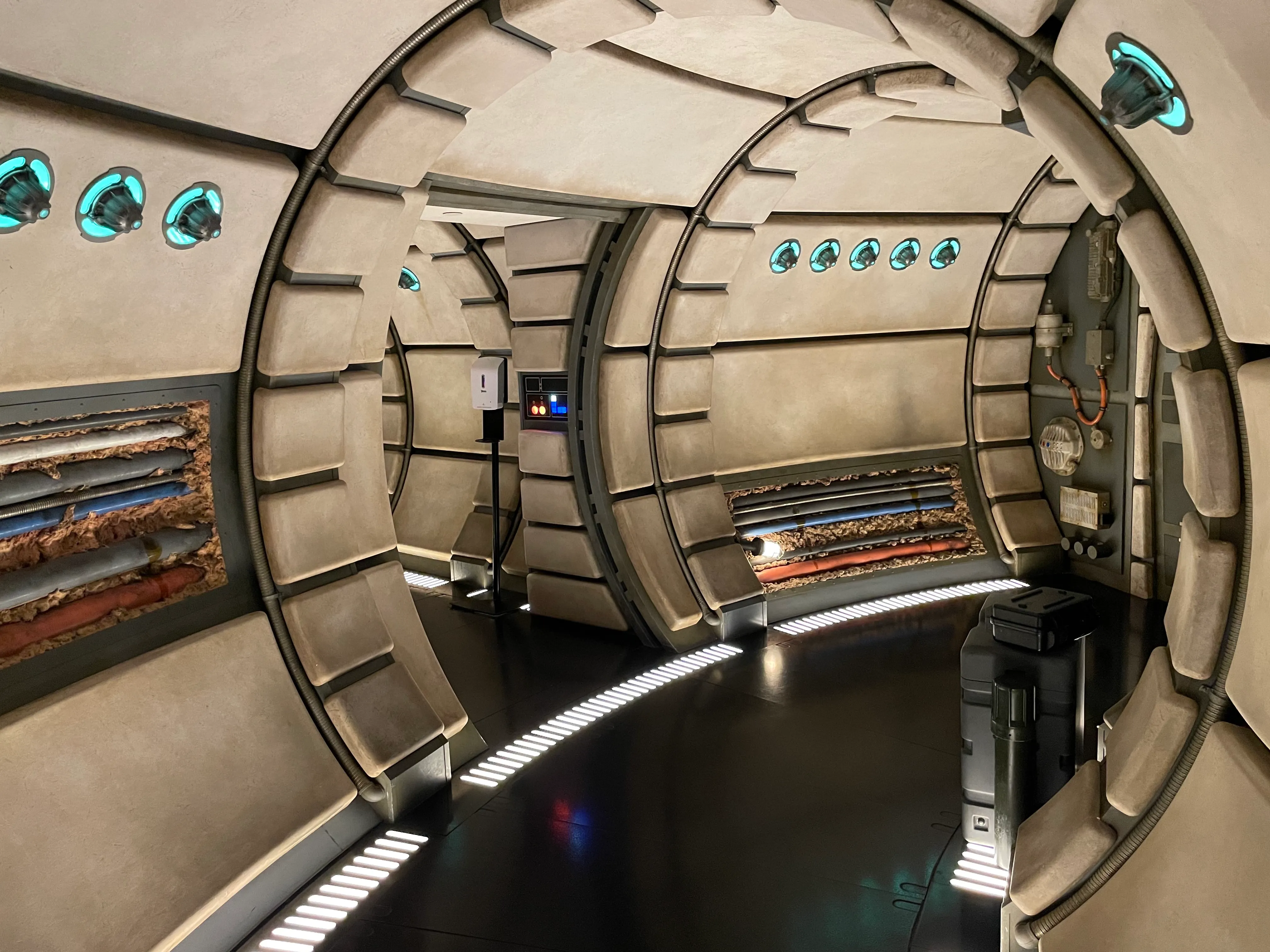 A hand sanitizer dispenser inside the Millennium Falcon